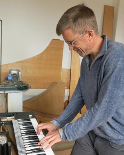 David Yearsley plays keyboard